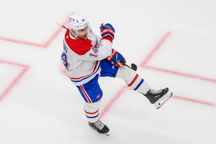 Canadiens centre Nick Suzuki celebrates after scoring during the third period against the Utah Mammoth on Wednesday in Salt Lake City.