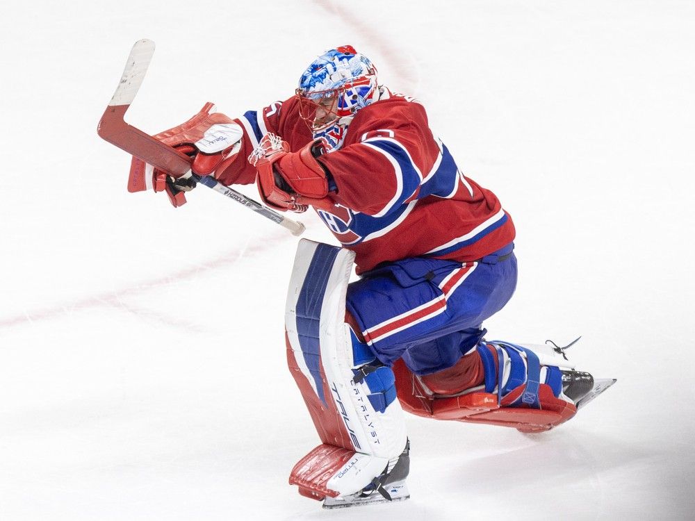 Canadiens goaltender Jakub Dobes celebrates a shootout victory over the Winnipeg Jets at the Bell Centre on Wednesday, Dec. 3, 2025.