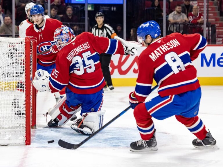 Canadiens' Mike Matheson controls a puck that had got behind Sam Montembeault as fellow defenceman Noah Dobson watches during the second period of a National Hockey League game against the Ottawa Senators in Montreal Tuesday Dec. 2, 2025.