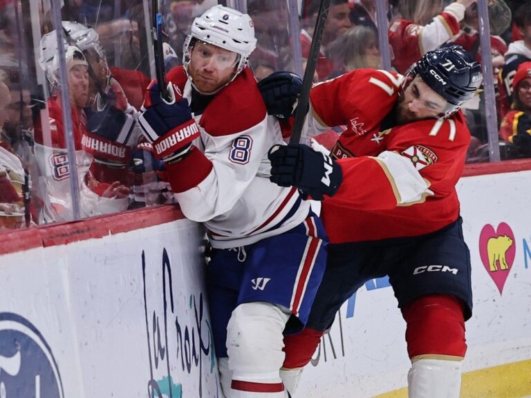 Florida Panthers' Luke Kunin (71) collides with Canadiens' Mike Matheson (8) at Amerant Bank Arena on Dec. 30, 2025, in Sunrise, Fla.
