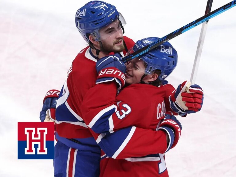 Canadiens' Kirby Dach, left, hugs Cole Caufield after win over the Minnesota Wild in Montreal on Tuesday.