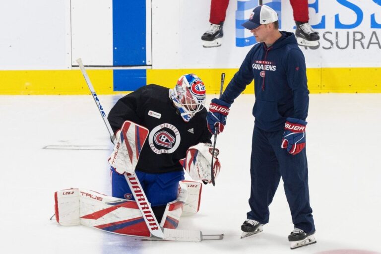 FILE - Montreal Canadiens goaltender Sam Montembeault works out with a goalie coach Eric Raymond on the first day of NHL hockey rookie camp in Brossard, Quebec, Sept. 13, 2023. (Christinne Muschi/The Canadian Press via AP, File)