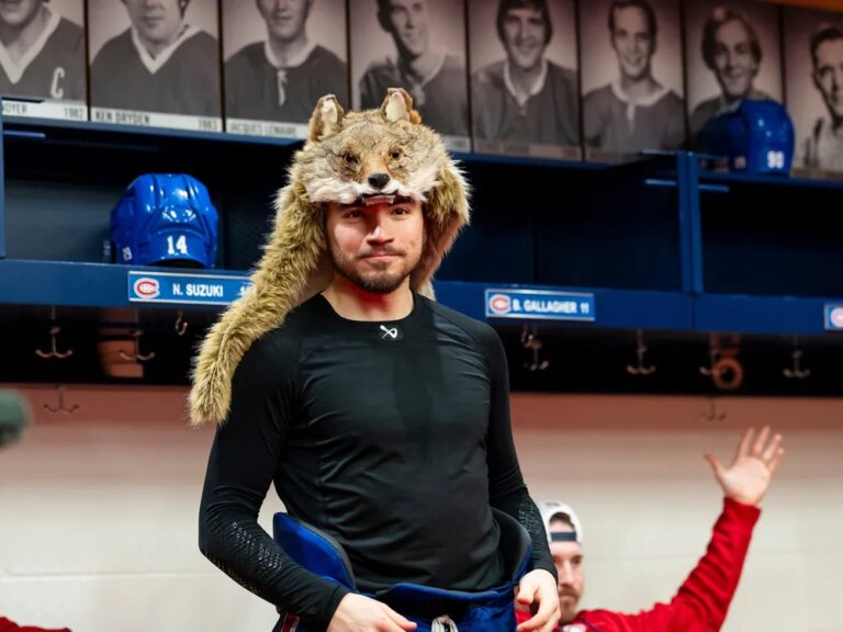 Canadiens captain Nick Suzuki wears a wolf hat after being named player of the game by his teammates following a 7-3 win over the Colorado Avalanche at the Bell Centre on Thursday, Jan. 29, 2026.