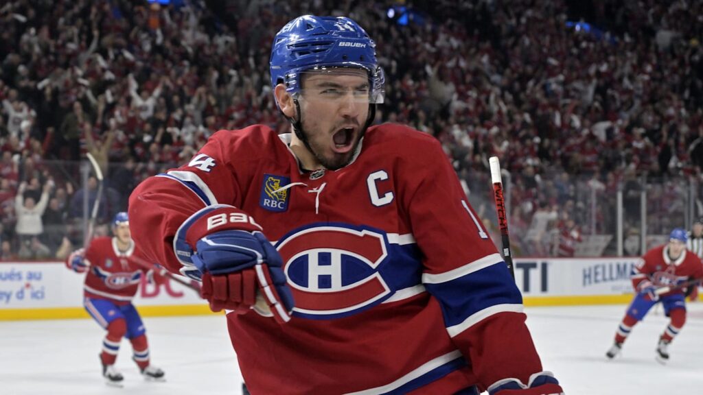 Apr 25, 2025; Montreal, Quebec, CAN; Montreal Canadiens forward Nick Suzuki (14) celebrates after scoring a goal against the Washington Capitals during the second period in game three of the first round of the 2025 Stanley Cup Playoffs at the Bell Centre. Mandatory Credit: Eric Bolte-Imagn Images