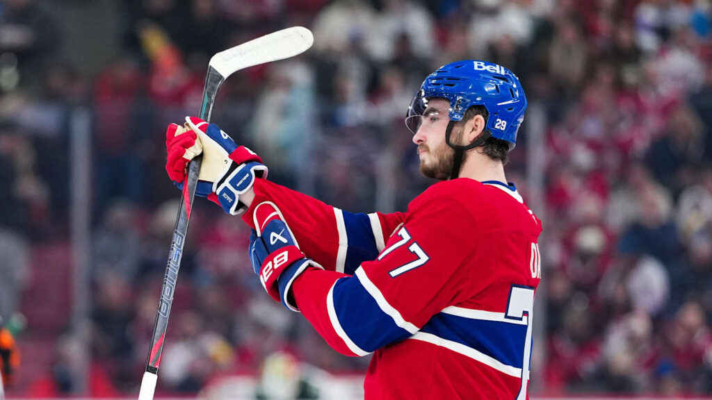 Jan 20, 2026; Montreal, Quebec, CAN; Montreal Canadiens forward Kirby Dach (77) steps on the ice during the first period of the game against the Minnesota Wild at the Bell Centre. Mandatory Credit: Eric Bolte-Imagn Images