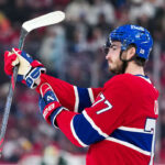 Jan 20, 2026; Montreal, Quebec, CAN; Montreal Canadiens forward Kirby Dach (77) steps on the ice during the first period of the game against the Minnesota Wild at the Bell Centre. Mandatory Credit: Eric Bolte-Imagn Images