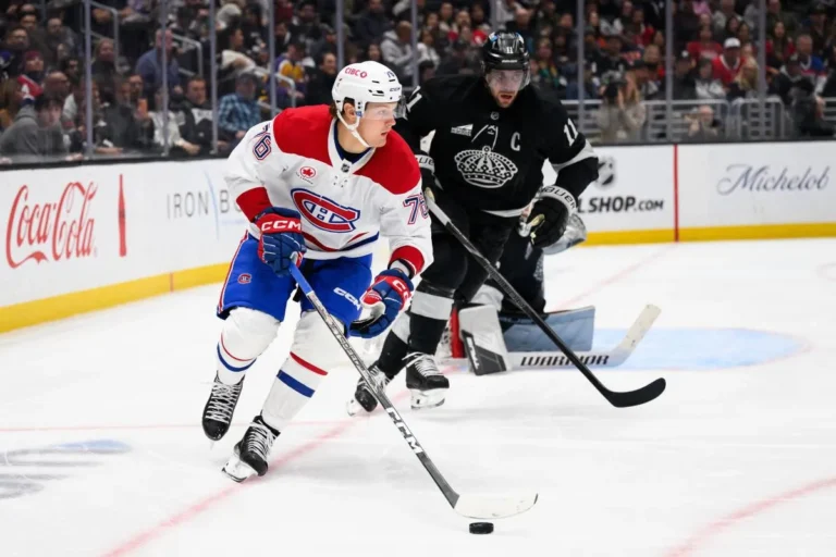 Montr&eacute;al Canadiens right wing Zachary Bolduc (76) controls the puck while under pressure from Los Angeles Kings center Anze Kopitar (11) during the third period at Crypto.com Arena.