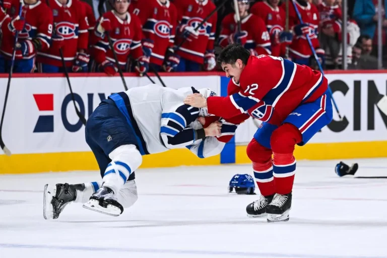 Montreal Canadiens defenseman Arber Xhekaj (72) fights Winnipeg Jets center Adam Lowry (17) during the first period at Bell Centre.