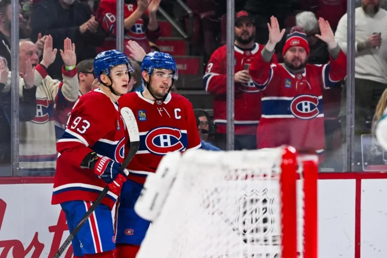 Montreal Canadiens center Nick Suzuki (14) celebrates with right wing Ivan Demidov (93) his goal against the San Jose Sharks during the second period at Bell Centre.