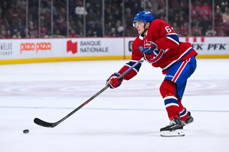 Montreal Canadiens defenseman David Reinbacher (64) shoots the puck Toronto Maple Leafs during the third period at Bell Centre.