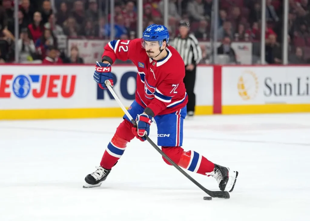 Montreal Canadiens defenseman Arber Xhekaj (72) takes a shot during the second period of the game against the Tampa Bay Lightning at the Bell Centre.