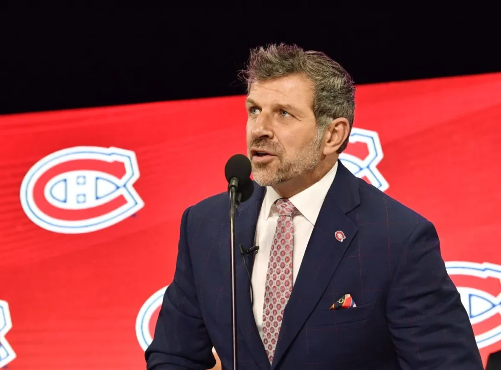 Montreal Canadiens general manager Marc Bergevin announces the third overall pick in the first round of the 2018 NHL Draft at American Airlines Center.