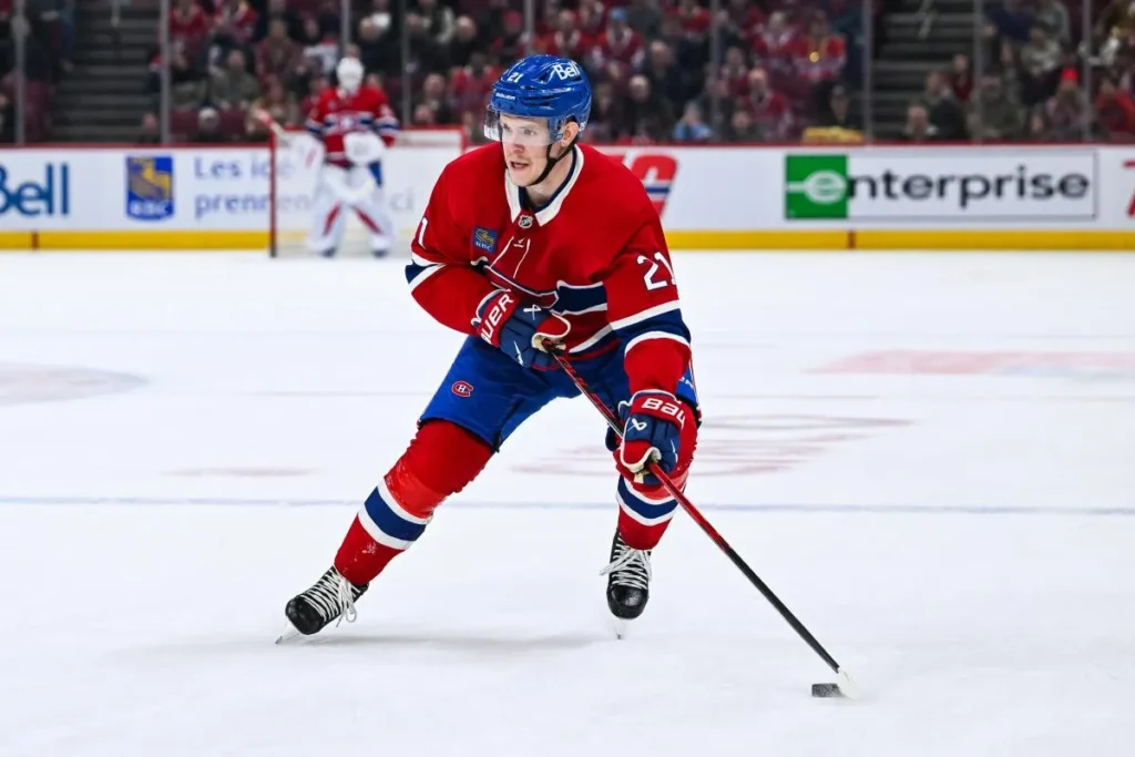 Montreal Canadiens defenseman Kaiden Guhle (21) plays the puck against the Anaheim Ducks during the first period at Bell Centre.