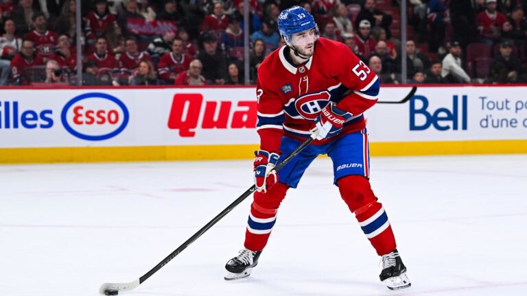 Mar 21, 2026; Montreal, Quebec, CAN; Montreal Canadiens defenseman Noah Dobson (53) plays the puck against the New York Islanders during the second period at Bell Centre. Mandatory Credit: David Kirouac-Imagn Images