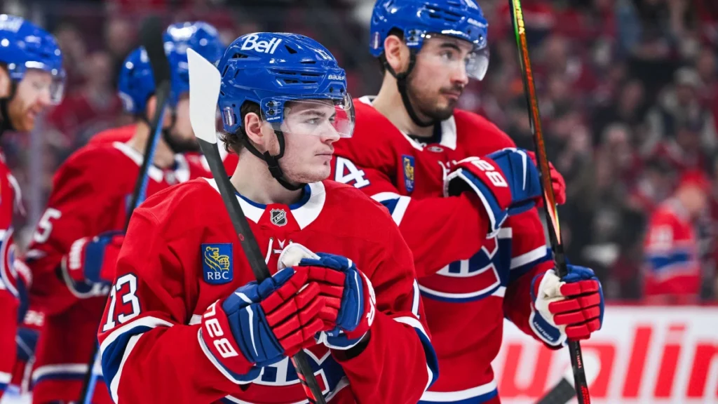 Montreal Canadiens right wing Cole Caufield (13) looks on beside center Nick Suzuki (14) against the Tampa Bay Lightning during the second period in game four of the first round of the 2026 Stanley Cup Playoffs at Bell Centre.