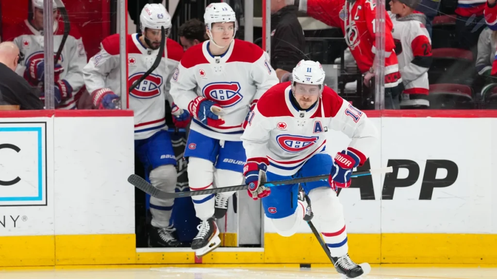 Montreal Canadiens right wings Brendan Gallagher (11) and Cole Caufield (13) skate during warmups before a game against the Carolina Hurricanes at Lenovo Center.