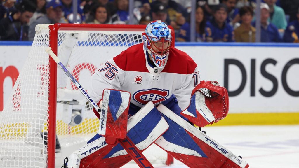 May 6, 2026; Buffalo, New York, USA; Montréal Canadiens goaltender Jakub Dobes (75) looks for the puck during the second period against the Buffalo Sabres in game one of the second round of the 2026 Stanley Cup Playoffs at KeyBank Center. Mandatory Credit: Timothy T. Ludwig-Imagn Images
