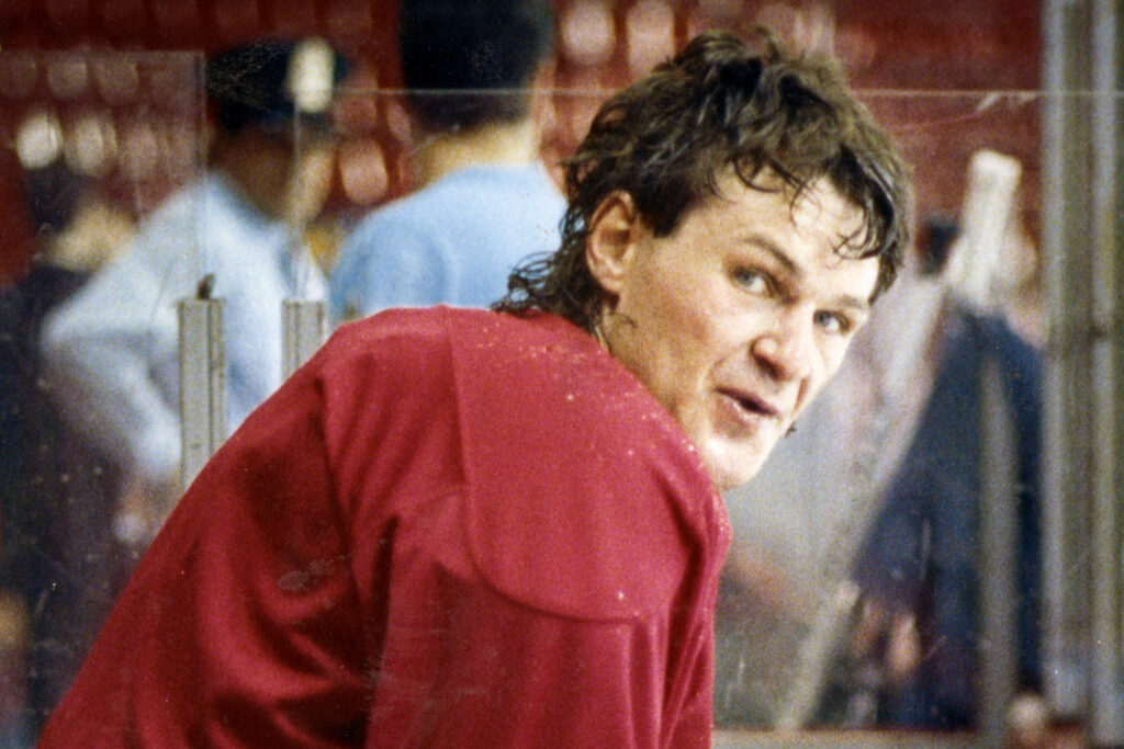 Canadiens player Claude Lemieux takes a break at a practice in a vintage photo.