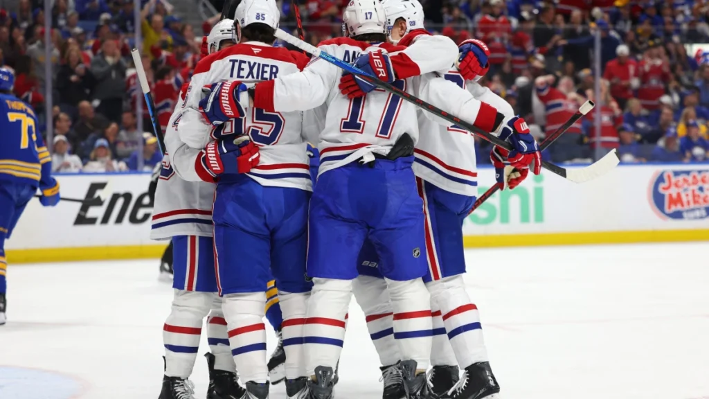 Montr&eacute;al Canadiens left wing Alexandre Texier (85) celebrates his goal with teammates during the first period against the Buffalo Sabres in game five of the second round of the 2026 Stanley Cup Playoffs at KeyBank Center.