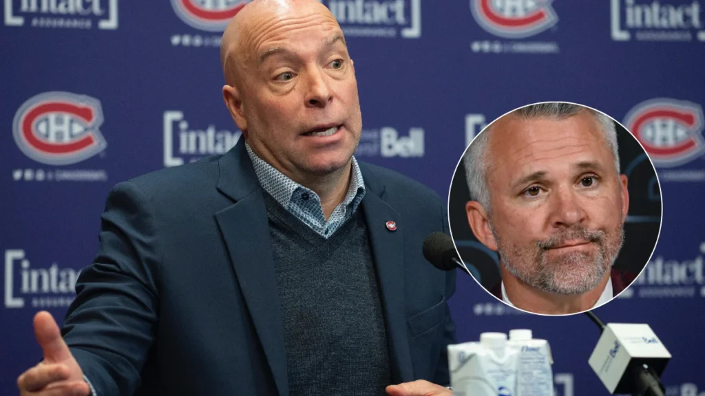 Photo of Montreal Canadiens general manager Kent Hughes speaking to the media during a press conference. Martin St-Louis (right)