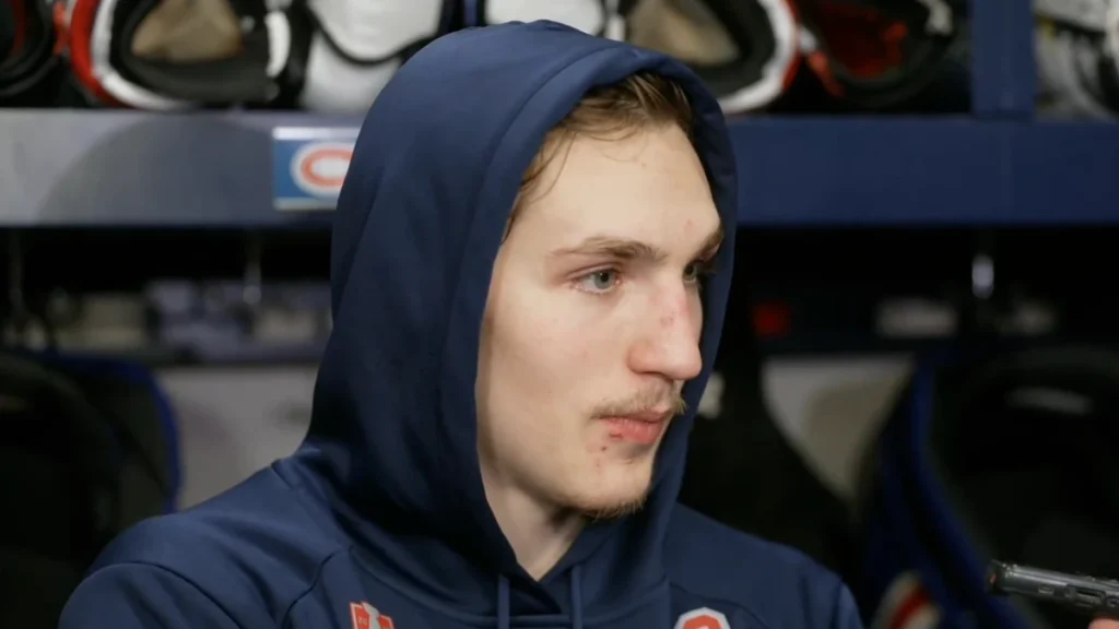 Montreal Canadiens defenseman Lane Hutson speaks to the media during a press conference.