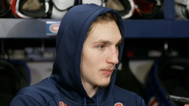 Montreal Canadiens defenseman Lane Hutson speaks to the media during a press conference.