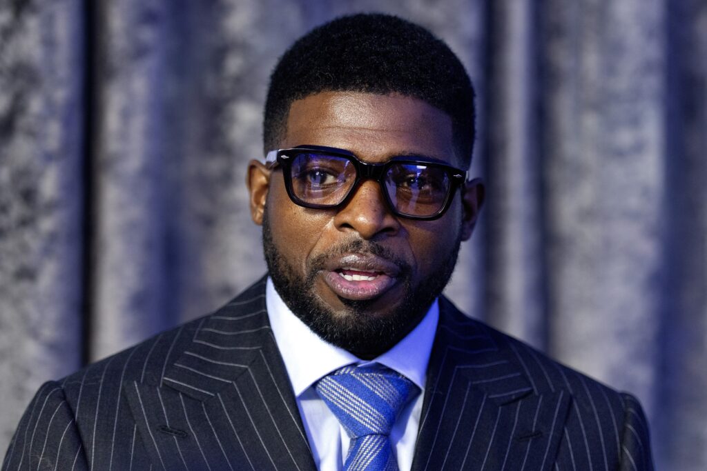 Former Montreal Canadiens star P.K. Subban dressed in a blue suit.