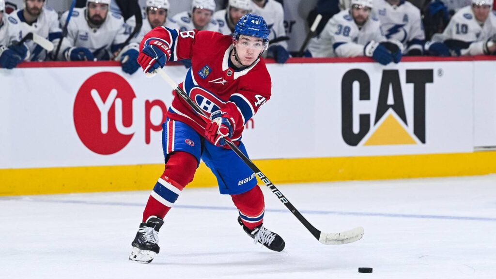 Apr 26, 2026; Montreal, Quebec, CAN; Montreal Canadiens defenseman Lane Hutson (48) passes the puck during the first period in game four of the first round of the 2026 Stanley Cup Playoffs at Bell Centre. Mandatory Credit: David Kirouac-Imagn Images