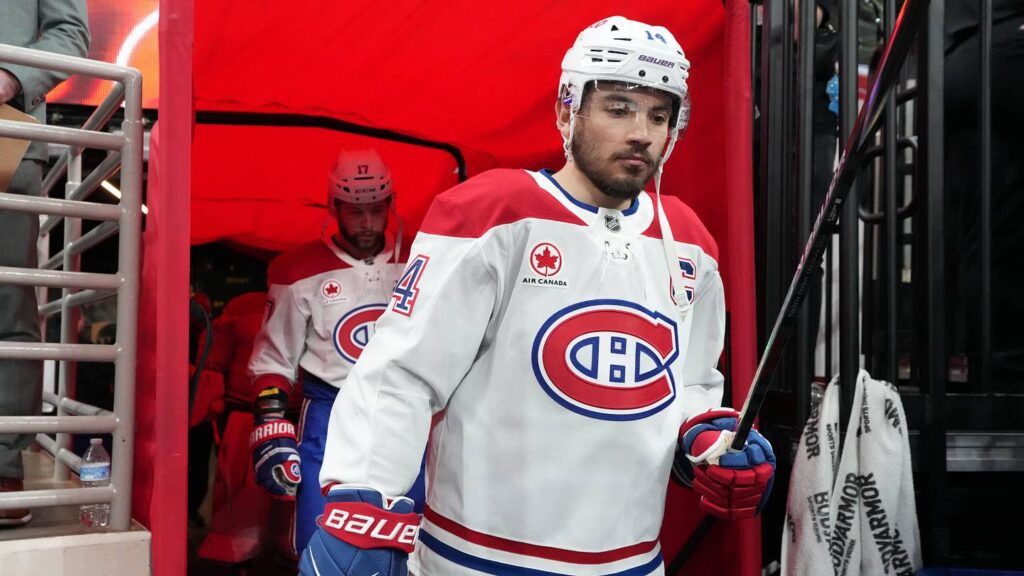 May 29, 2026; Raleigh, North Carolina, USA; Montreal Canadiens center Nick Suzuki (14) walks to the ice for warmups before game five of the Eastern Conference Final of the 2026 Stanley Cup Playoffs against the Carolina Hurricanes at Lenovo Center. Mandatory Credit: James Guillory-Imagn Images
