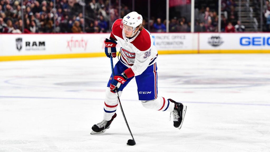 Feb 14, 2018; Denver, CO, USA; Montreal Canadiens right wing Nikita Scherbak (38) takes a shot on goal in the third period against the Colorado Avalanche at the Pepsi Center. Mandatory Credit: Ron Chenoy-Imagn Images