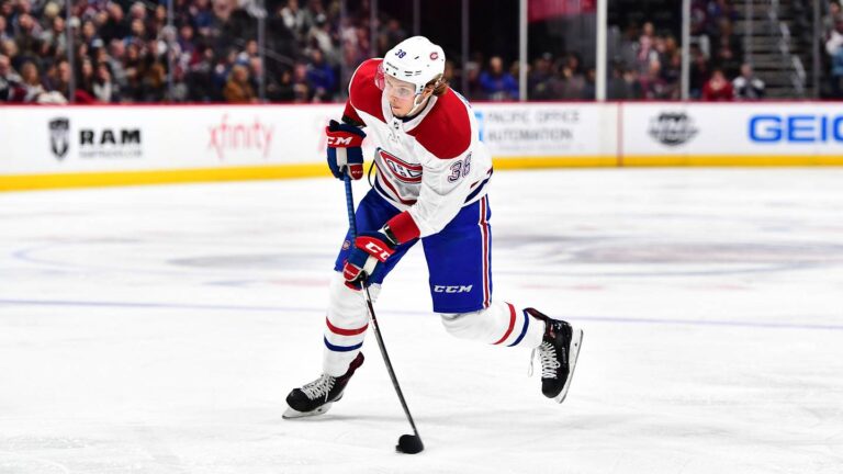 Feb 14, 2018; Denver, CO, USA; Montreal Canadiens right wing Nikita Scherbak (38) takes a shot on goal in the third period against the Colorado Avalanche at the Pepsi Center. Mandatory Credit: Ron Chenoy-Imagn Images