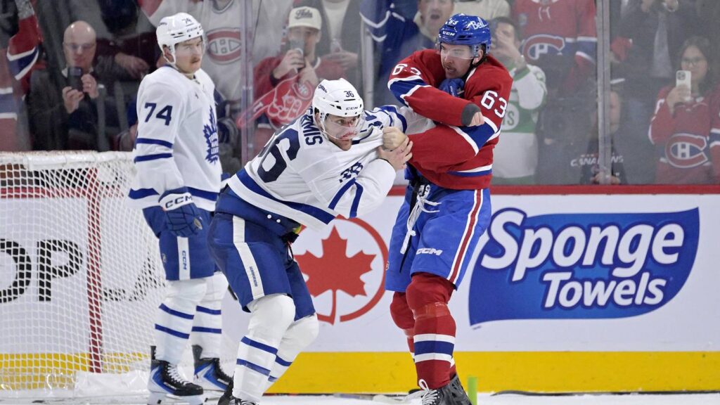 Nov 22, 2025; Montreal, Quebec, CAN; Montreal Canadiens forward Florian Xhekaj (63) fights Toronto Maple Leafs defenseman Dakota Mermis (36) during the third period at the Bell Centre. Mandatory Credit: Eric Bolte-Imagn Images