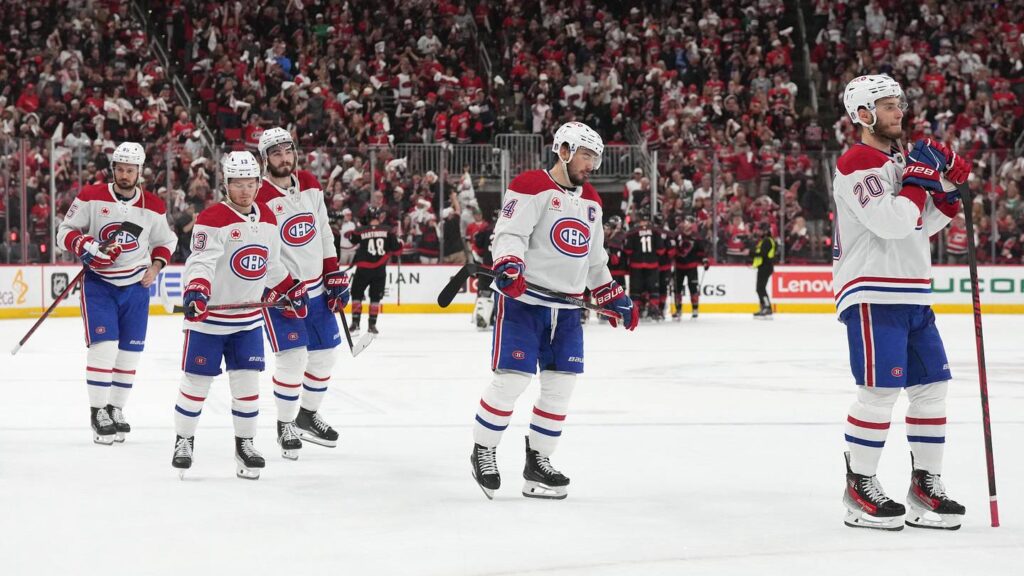 May 29, 2026; Raleigh, North Carolina, USA; Montreal Canadiens left wing Juraj Slafkovsky (20) skates toward goaltender Jakub Dobes (not pictured) with center Nick Suzuki (14), right wing Cole Caufield (13), right wing Josh Anderson (17) and left wing Alexandre Texier (85) after losing to the Carolina Hurricanes in game five of the Eastern Conference Final of the 2026 Stanley Cup Playoffs at Lenovo Center. Mandatory Credit: James Guillory-Imagn Images