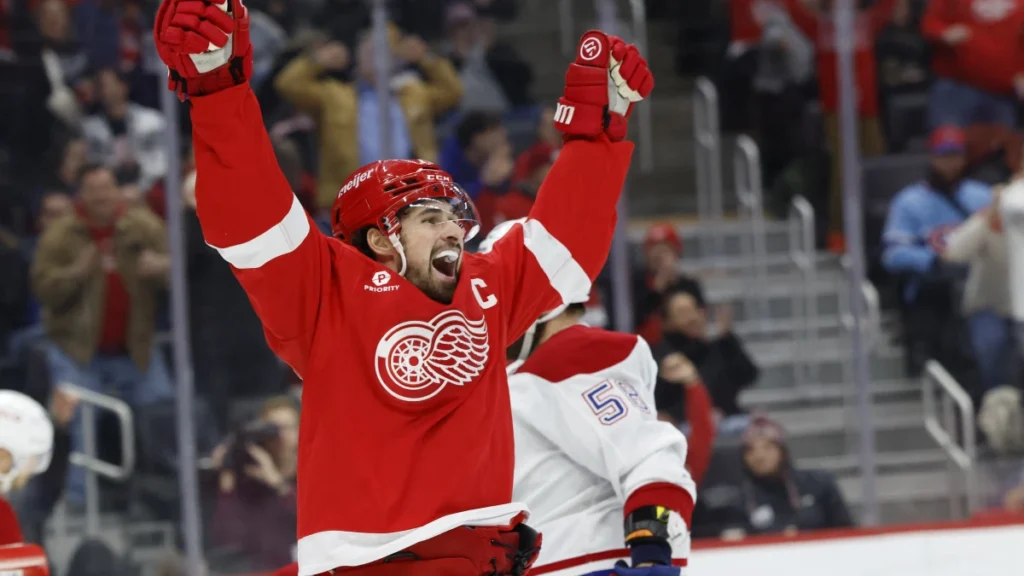 Detroit Red Wings center Dylan Larkin (71) celebrates after scoring in the second period against the Montreal Canadiens at Little Caesars Arena.