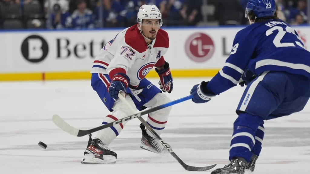 defenseman Arber Xhekaj (72) defends against Toronto Maple Leafs forward Matthew Knies (23) during the second period at Scotiabank Arena.