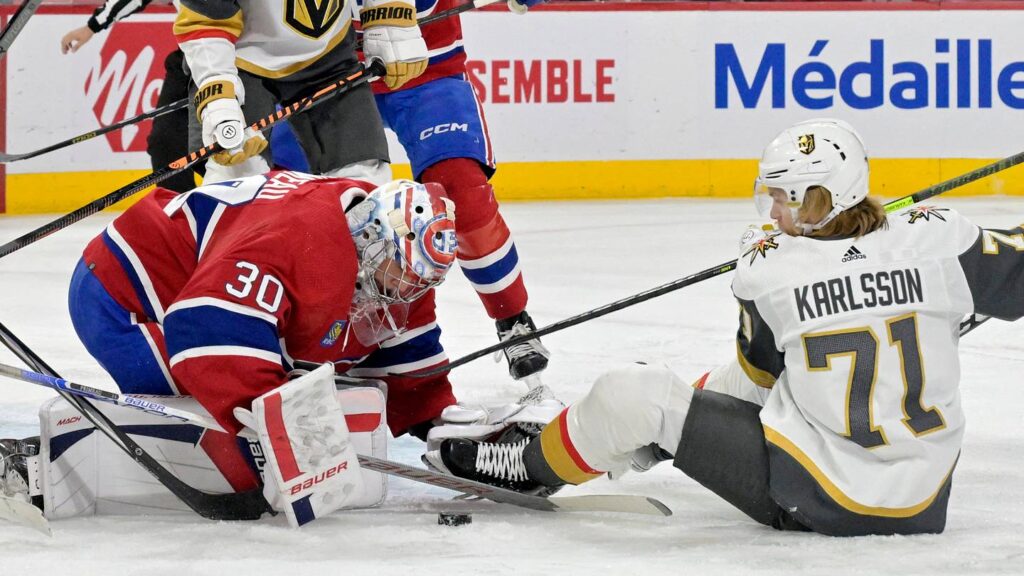 Nov 16, 2023; Montreal, Quebec, CAN; Montreal Canadiens goalie Cayden Primeau (30) stops Vegas Golden Knights forward William Karlsson (71) during the first period at the Bell Centre. Mandatory Credit: Eric Bolte-USA TODAY Sports