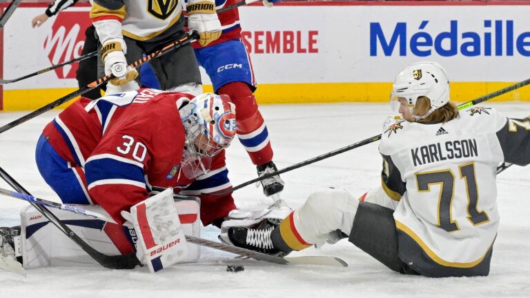 Nov 16, 2023; Montreal, Quebec, CAN; Montreal Canadiens goalie Cayden Primeau (30) stops Vegas Golden Knights forward William Karlsson (71) during the first period at the Bell Centre. Mandatory Credit: Eric Bolte-USA TODAY Sports