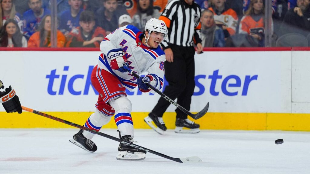Nov 29, 2024; Philadelphia, Pennsylvania, USA; New York Rangers left wing Brett Berard (65) shoots the puck against the Philadelphia Flyers in the second period at Wells Fargo Center. Mandatory Credit: Kyle Ross-Imagn Images