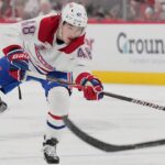 May 29, 2026; Raleigh, North Carolina, USA; Montreal Canadiens defenseman Lane Hutson (48) shoots the puck against the Carolina Hurricanes in game five of the Eastern Conference Final of the 2026 Stanley Cup Playoffs during the second period at Lenovo Center. Mandatory Credit: James Guillory-Imagn Images