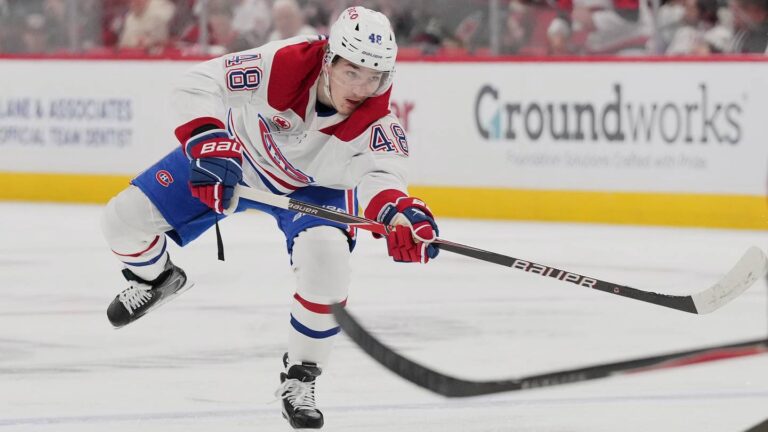 May 29, 2026; Raleigh, North Carolina, USA; Montreal Canadiens defenseman Lane Hutson (48) shoots the puck against the Carolina Hurricanes in game five of the Eastern Conference Final of the 2026 Stanley Cup Playoffs during the second period at Lenovo Center. Mandatory Credit: James Guillory-Imagn Images
