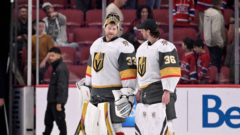Nov 5, 2022; Montreal, Quebec, CAN;  Vegas Golden Knights goalie Adin Hill (33) and teammate goalie Logan Thompson (36) leave the ice after the win against the Montreal Canadiens at the Bell Centre. Mandatory Credit: Eric Bolte-USA TODAY Sports