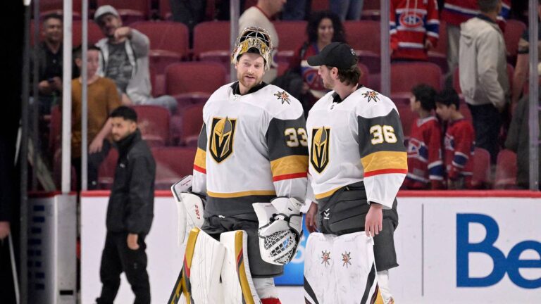 Nov 5, 2022; Montreal, Quebec, CAN;  Vegas Golden Knights goalie Adin Hill (33) and teammate goalie Logan Thompson (36) leave the ice after the win against the Montreal Canadiens at the Bell Centre. Mandatory Credit: Eric Bolte-USA TODAY Sports