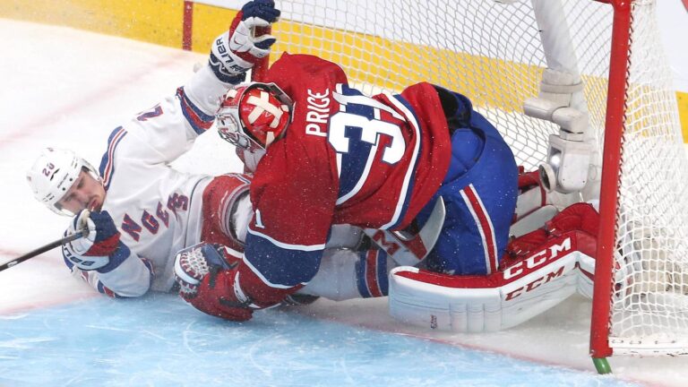 May 17, 2014; Montreal, Quebec, CAN; New York Rangers left wing Chris Kreider (20) crashes into Montreal Canadiens goalie Carey Price (31) during the second period in game one of the Eastern Conference Finals of the 2014 Stanley Cup Playoffs at Bell Centre. Mandatory Credit: Jean-Yves Ahern-USA TODAY Sports