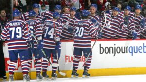 MONTREAL - FEBRUARY 01: Robert Lang #20 of the Montreal Canadiens celebrates his first period goal against the Boston Bruins at the players' bench at the Bell Centre on February 1, 2009 in Montreal, Quebec, Canada. (Photo by Andre Ringuette/NHLI via Getty Images)