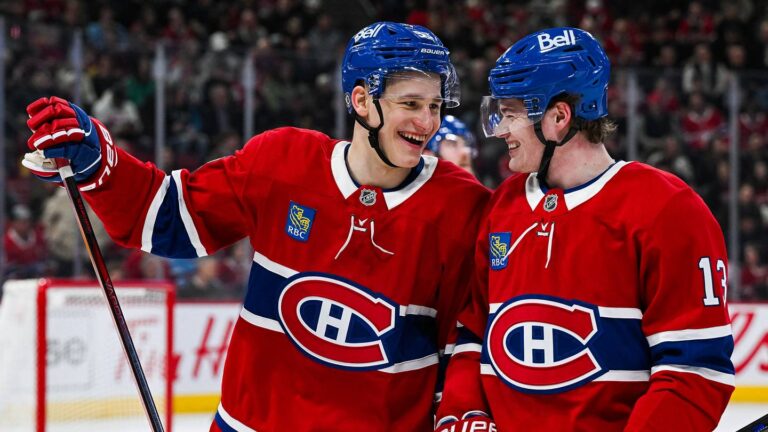 Apr 14, 2025; Montreal, Quebec, CAN; Montreal Canadiens right wing Ivan Demidov (93) celebrates with right wing Cole Caufield (13) after his first career goal against the Chicago Blackhawks in the first period at Bell Centre. Mandatory Credit: David Kirouac-Imagn Images