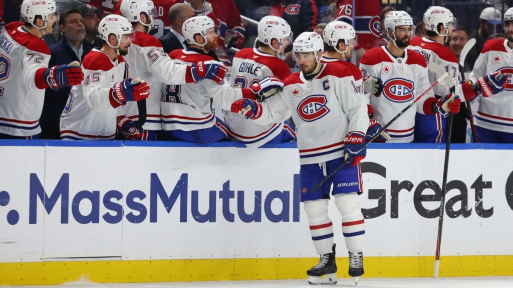 Montr&eacute;al Canadiens center Nick Suzuki (14) celebrates his goal with teammates during the second period against the Buffalo Sabres in game five of the second round of the 2026 Stanley Cup Playoffs at KeyBank Center.