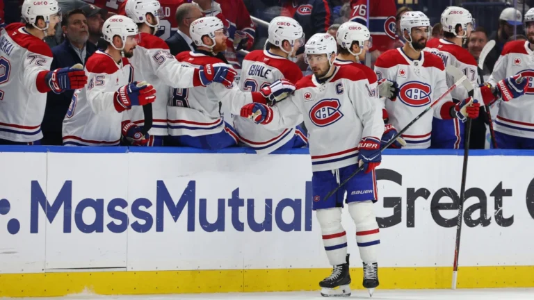 Montr&eacute;al Canadiens center Nick Suzuki (14) celebrates his goal with teammates during the second period against the Buffalo Sabres in game five of the second round of the 2026 Stanley Cup Playoffs at KeyBank Center.