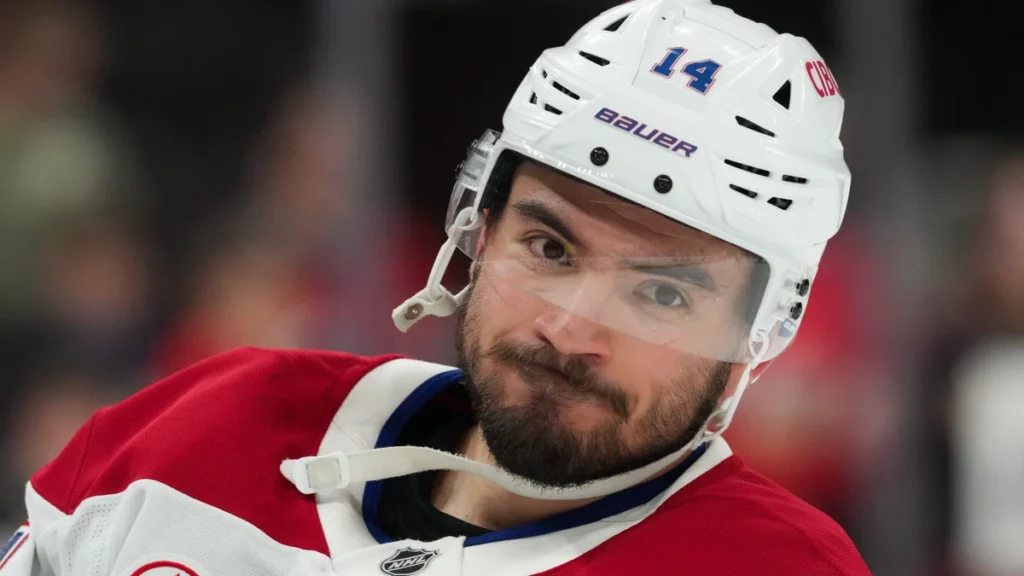 Montreal Canadiens center Nick Suzuki (14) looks on before the game against the Carolina Hurricanes in game two of the Eastern Conference Final of the 2026 Stanley Cup Playoffs at Lenovo Center.