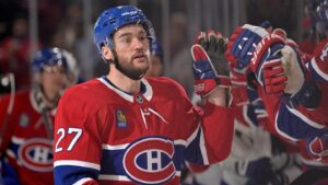 Mar 21, 2023; Montreal, Quebec, CAN; Montreal Canadiens forward Jonathan Drouin (27) celebrates with teammates after scoring a goal against the Tampa Bay Lightning during the first period at the Bell Centre. Mandatory Credit: Eric Bolte-USA TODAY Sports