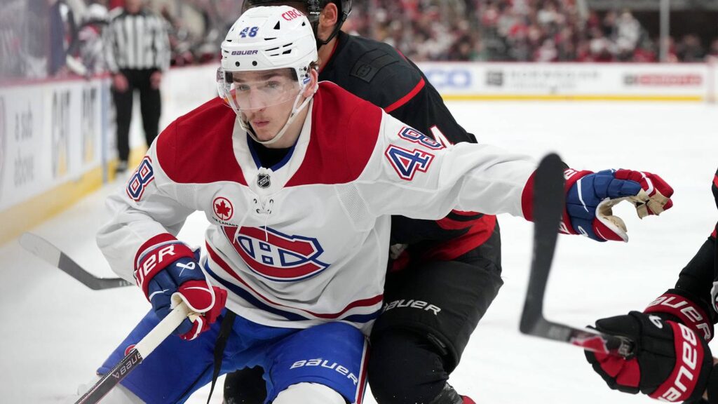 May 29, 2026; Raleigh, North Carolina, USA; Montreal Canadiens defenseman Lane Hutson (48) vies for the position against Carolina Hurricanes center Seth Jarvis (24) in game five of the Eastern Conference Final of the 2026 Stanley Cup Playoffs during the third period at Lenovo Center. Mandatory Credit: James Guillory-Imagn Images